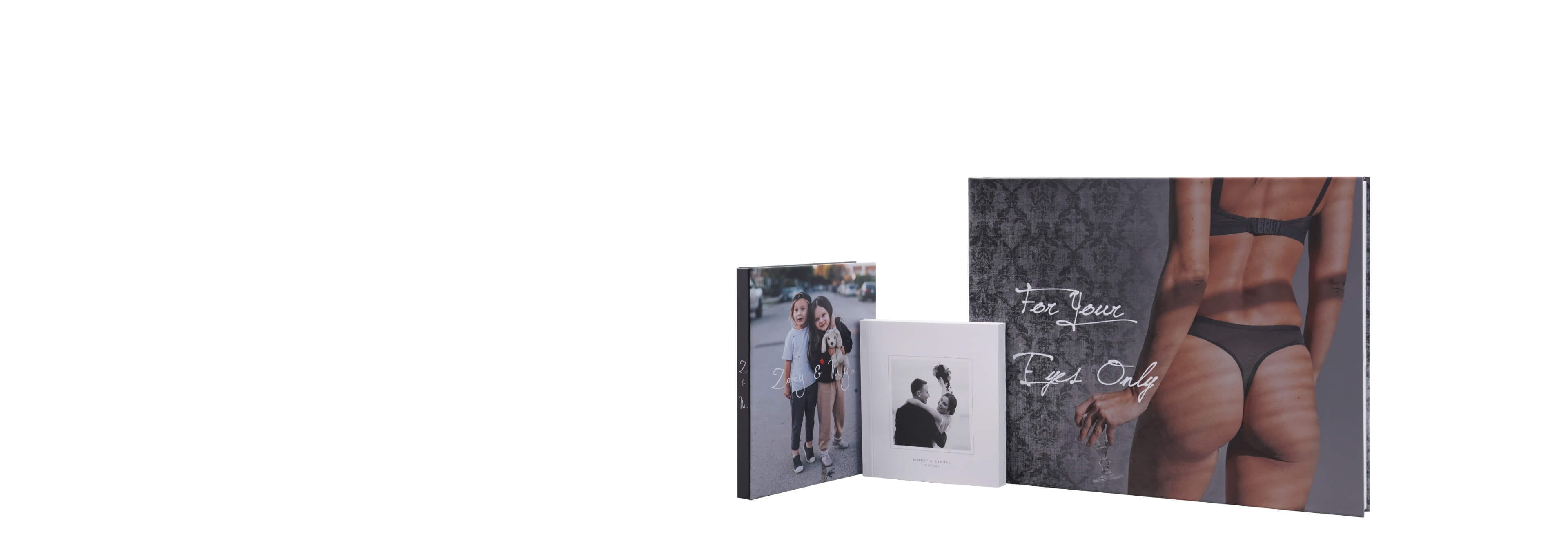 three press printed photo books in different sizes